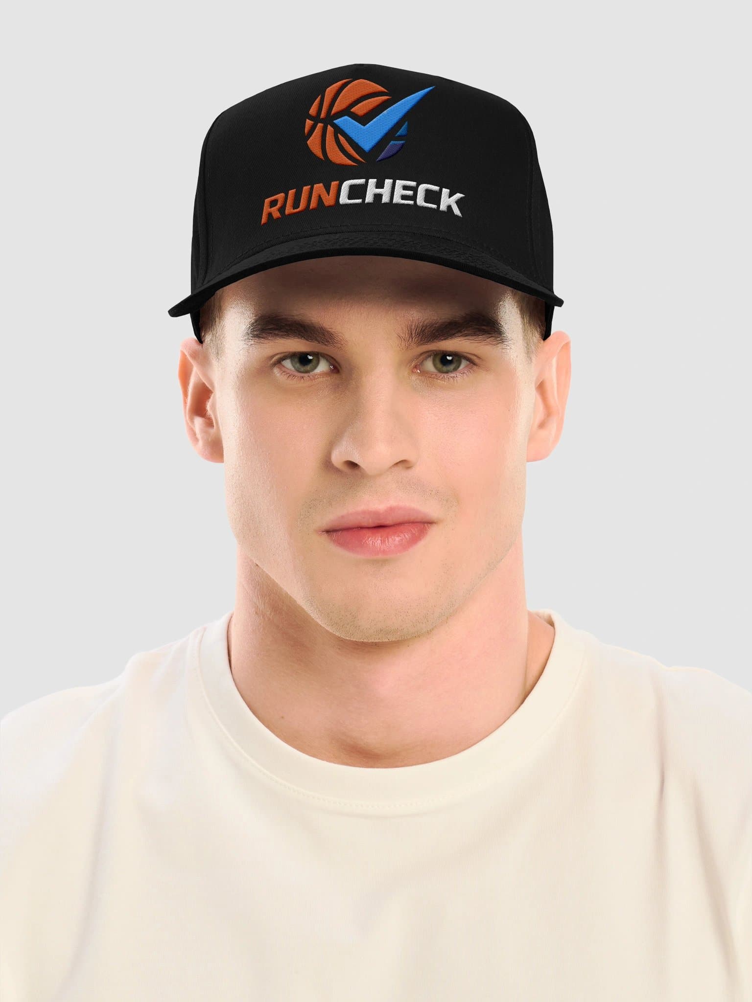 RunCheck Snapback in black, worn on model