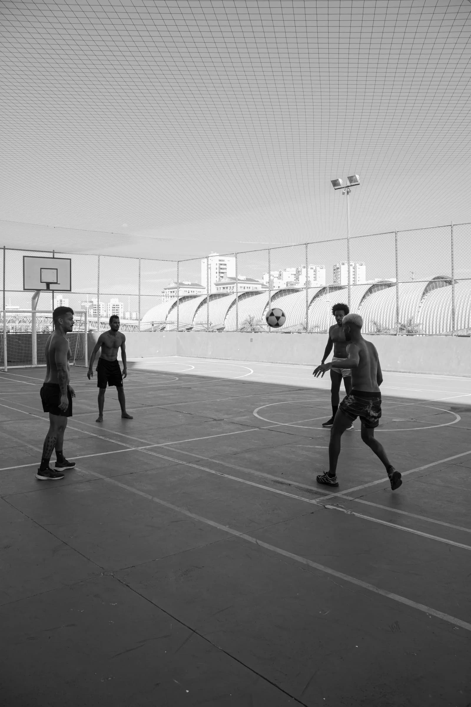 Pickup basketball players competing on an outdoor court